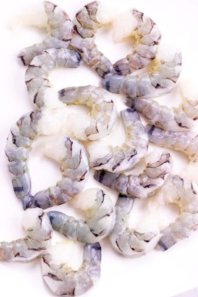 a plate of raw shrimp