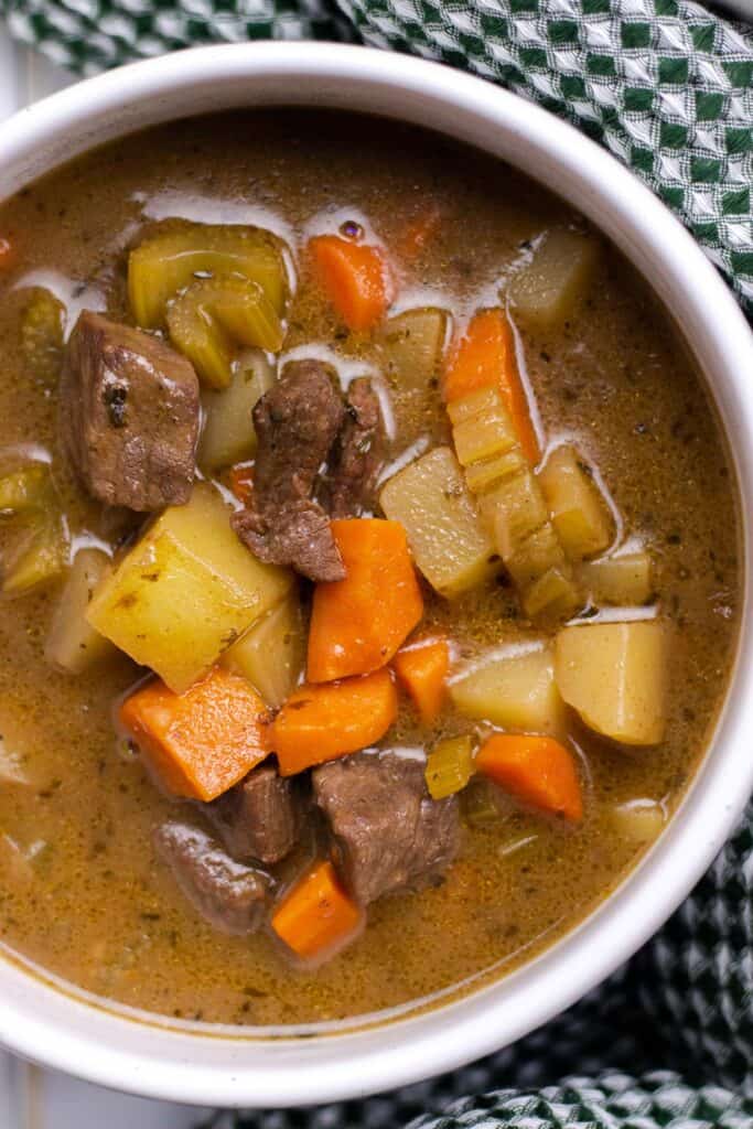 a close up photo of a bowl of classic beef stew