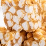 A stack of peanut butter marshmallow squares cut into bars.