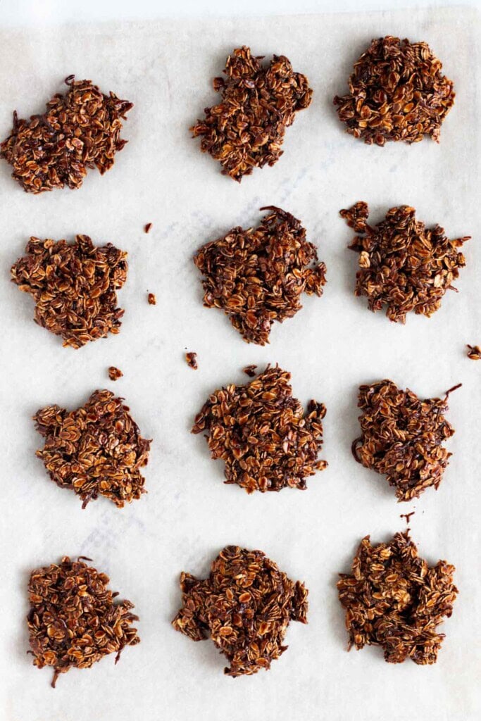 Haystack cookies portioned out on a baking sheet.