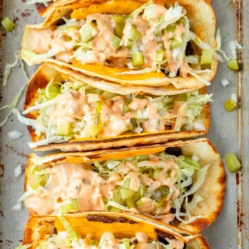 Big mac smash tacos lined up on a serving tray.