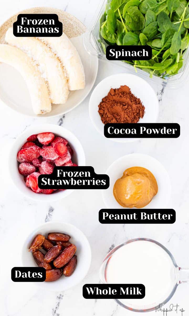 Ingredients include frozen bananas, frozen strawberries, spinach, dates, cocoa powder, peanut butter, and whole milk.
