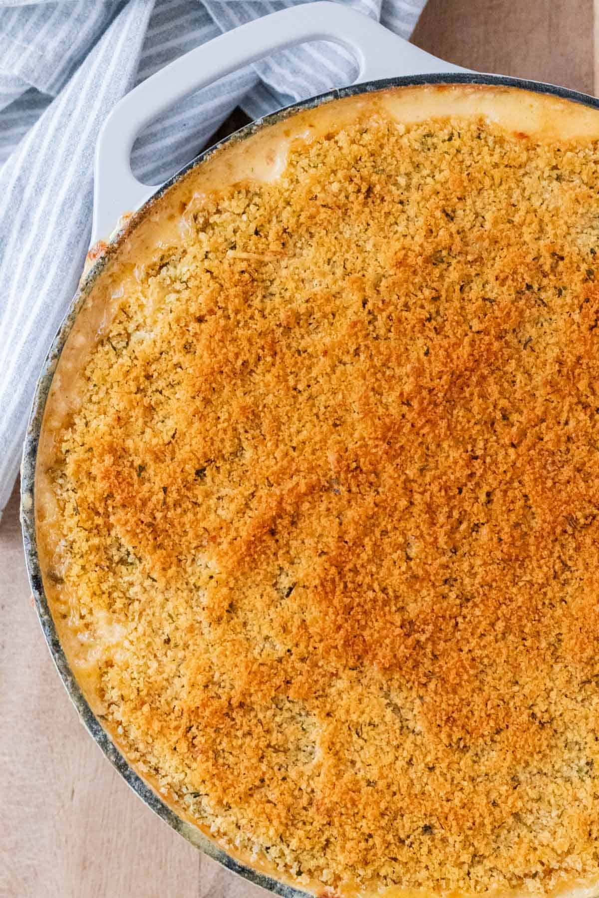 Mac and cheese after it has been baked and toasted to golden brown in the oven.