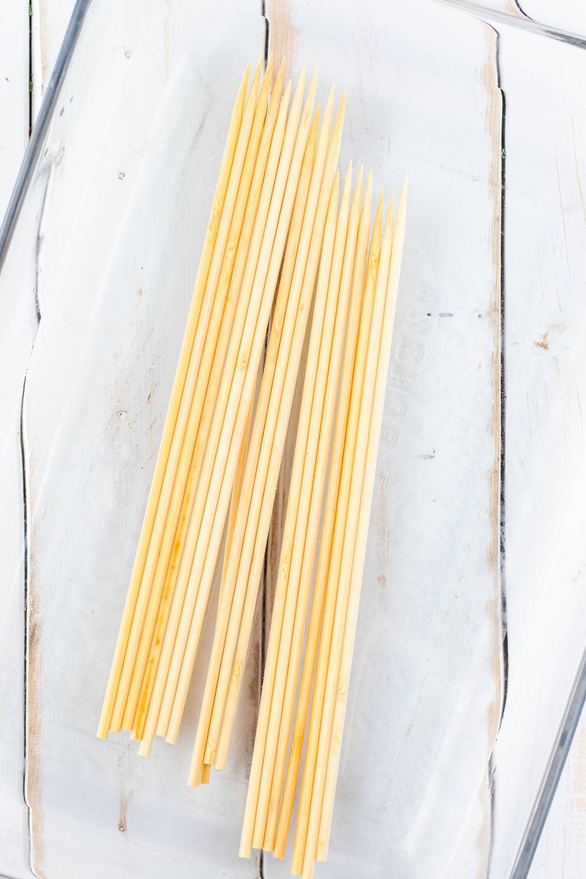 Soaking the wooden skewers in water.