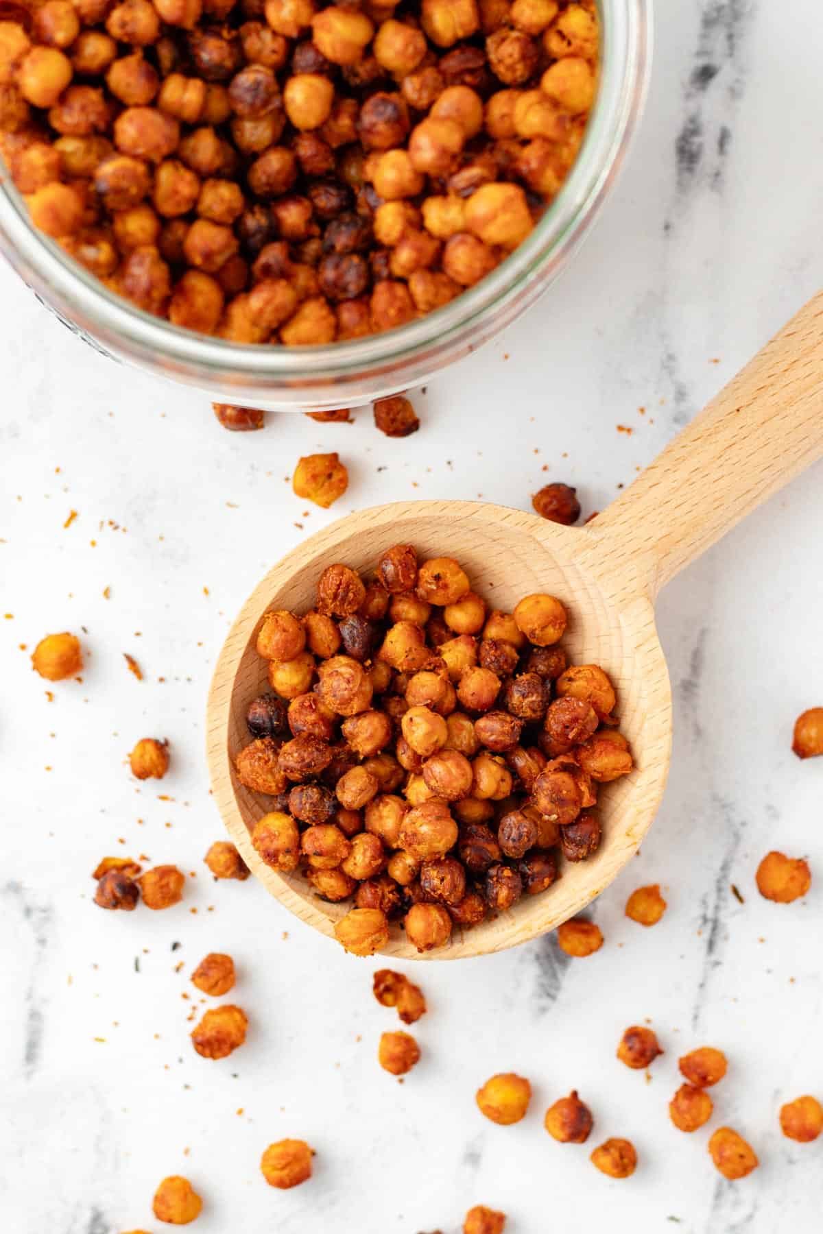 A wooden spoonful of buffalo chickpeas.