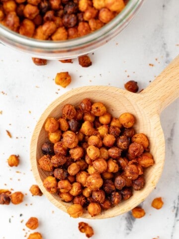 A wooden spoonful of buffalo chickpeas.