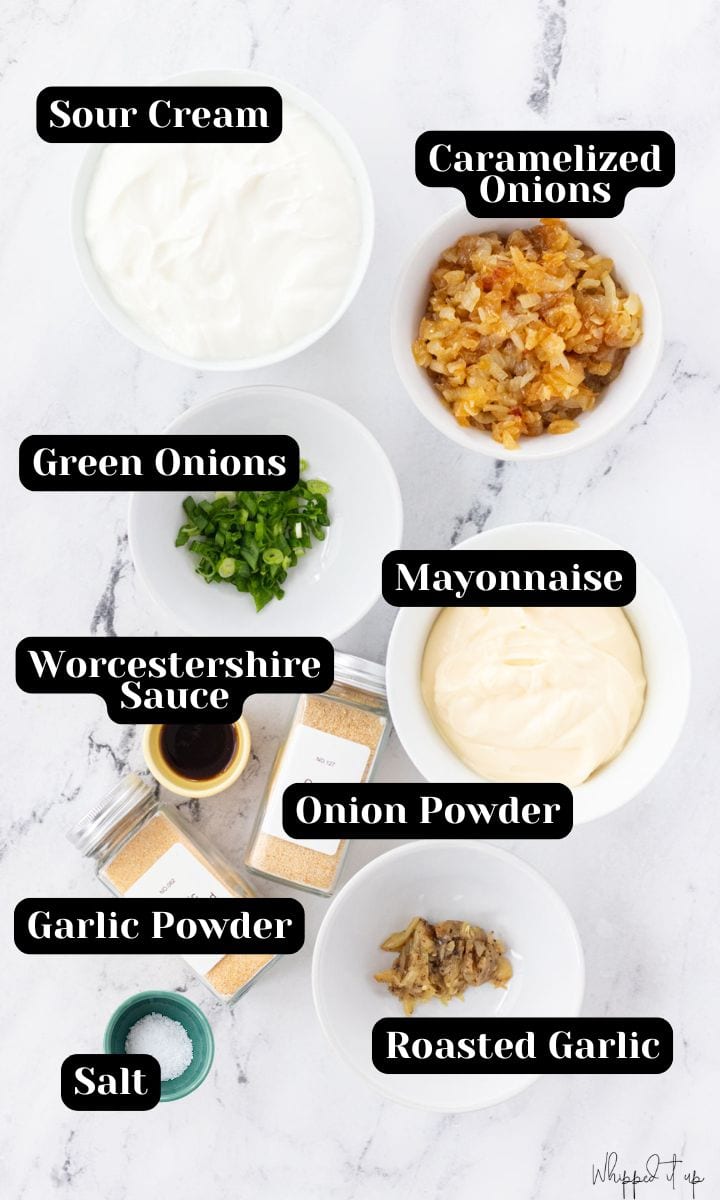 Ingredients include sour cream, caramelized onions, green onions, mayonnaise, Worcestershire sauce, onion powder, garlic powder, salt, and roasted garlic.