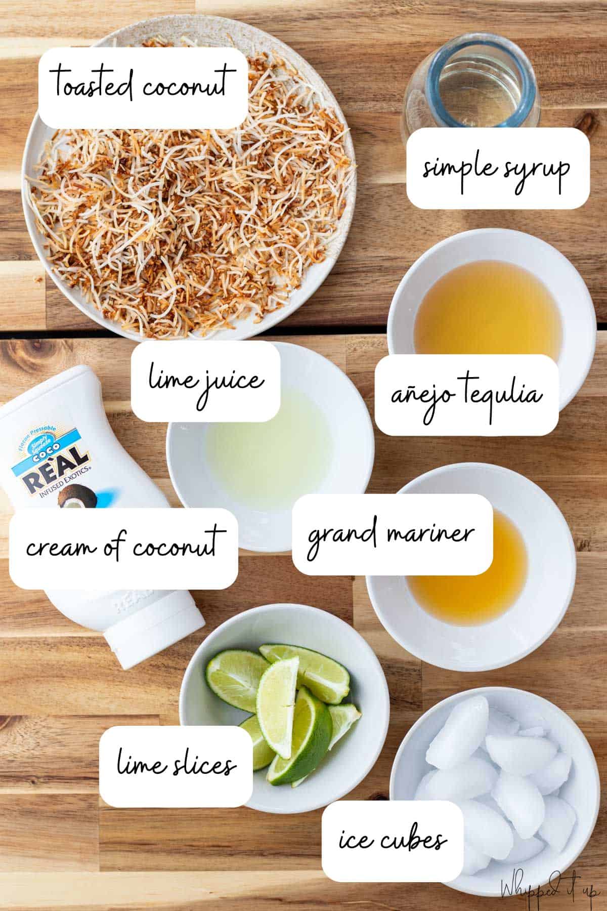 Ingredients laid out on a table in white bowls.