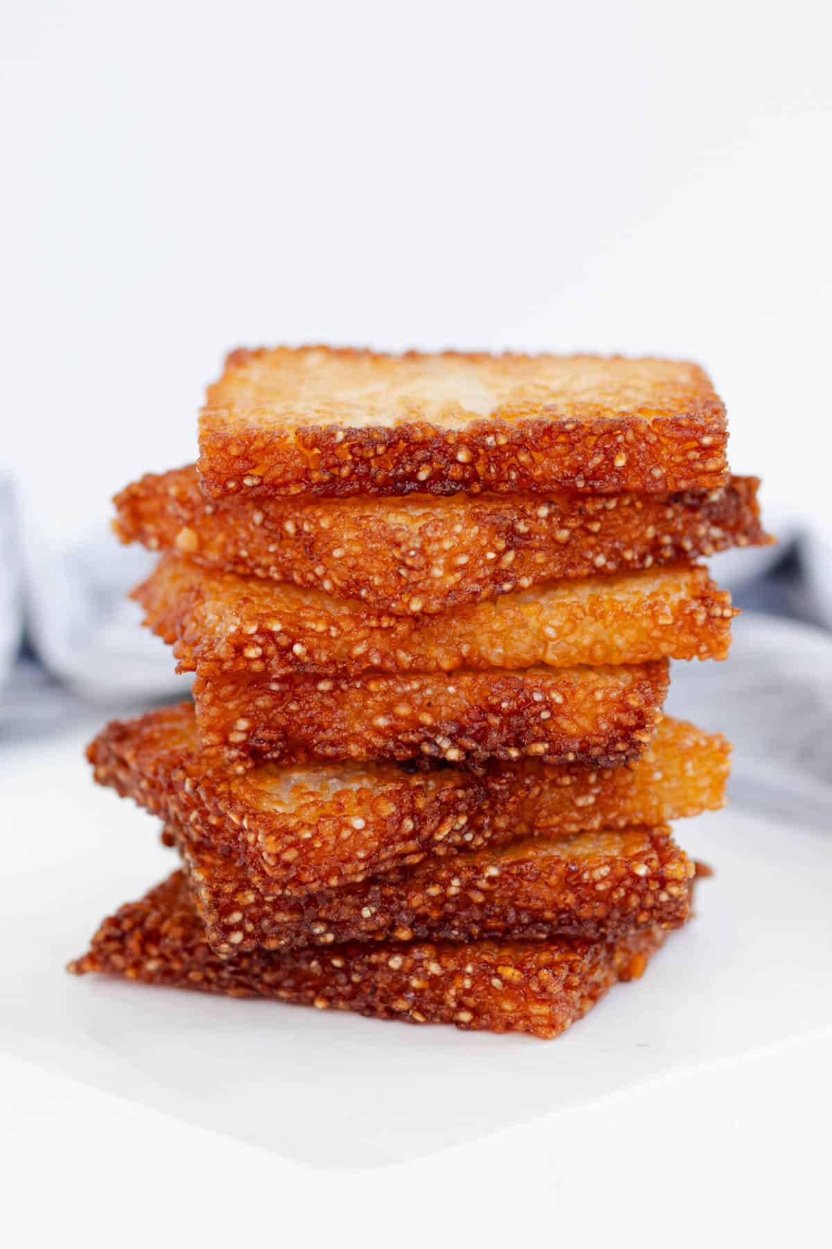 A large stack of crispy rice squares.
