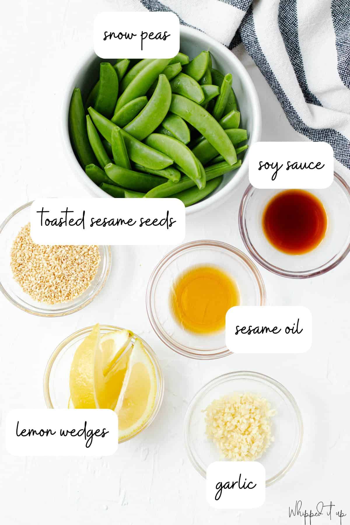 Ingredients measured out in white and clear bowls on a white background.