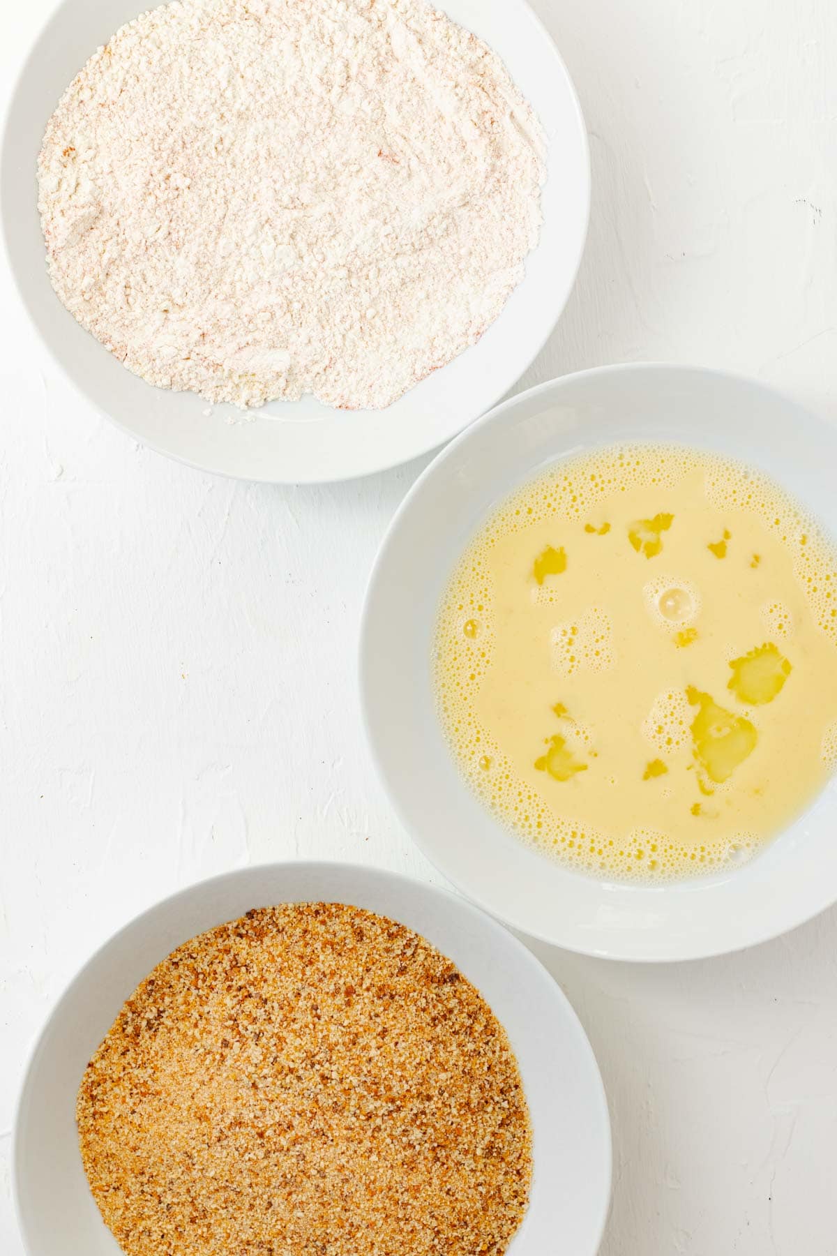 Three bowls for the breading station.