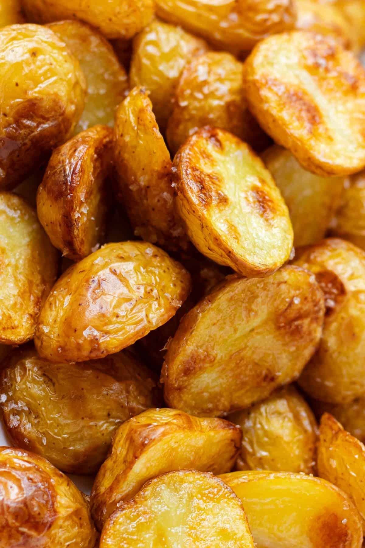 Close-up of crispy roasted salt and vinegar potatoes.